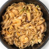 Lucky Koi · Rice Noodles, Fresh Vegetable Mix, Poached Shrimp, Shiitake Mushrooms, Malaysian Yellow Curr...