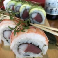 Kioto Roll · Tuna, crabstick and cream cheese topped with tuna, crabstick, white fish, shrimp and avocado.