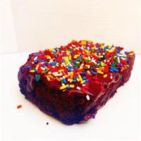 Jumbo Confetti Brownie · Jumbo Triple Fudge Brownie topped with rainbow sprinkles! This monster of a brownie can easi...