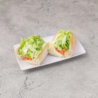 Cold Veggie Sub · Lettuce, tomato, pickle, onion, fresh green peppers and choice of cheese