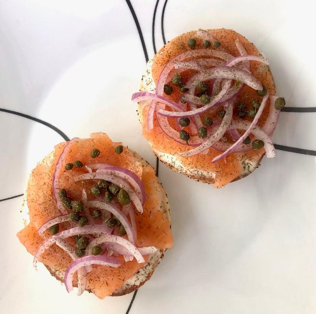 Smoked Salmon Bagel · Everything bagel with cream cheese, smoked salmon, red onions, capers, and dill. 