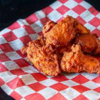 Buffalo Wings · Fried Chicken Wings with a Mild Buffalo Sauce cooked in. Served w/ Ranch Dip. 5 per order.