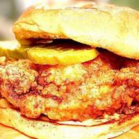 Country Fried Chicken Sandwich · Deep fried chicken breast/thigh topped with pickles on a toasted bread, Add a side.