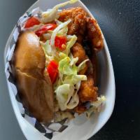 Xtra Spicy Rad Chicken Burger · Fried chicken breast, onions, pickles, coleslaw, fresno chile, spicy mud sauce, chipotle sau...