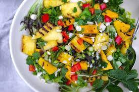 Carmel Salad · Mixed field greens with red onions, mango, pineapple, candied cashews and feta cheese. Tosse...