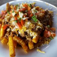 Jungle Fries · House made thick cut fries topped keema (seasoned ground beef) shredded cheddar cheese and k...