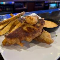 Pescado Chippers · Three beer battered white fish sticks and hand-cut fries.
