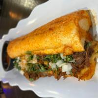 Big Foot Beef Birria Sandwich · Get 12 inches of pure deliciousness! Footlong french bread. Loaded with beef birria, melted ...