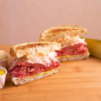 Reuben · Our world-famous corned beef on grilled rye with melted Swiss cheese, sauerkraut, 1000 Islan...