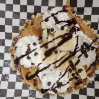 Peanut butter and banana waffle ·  Made to order- sweet cream waffle, creamy peanut butter, fresh banana, whipped cream, and c...