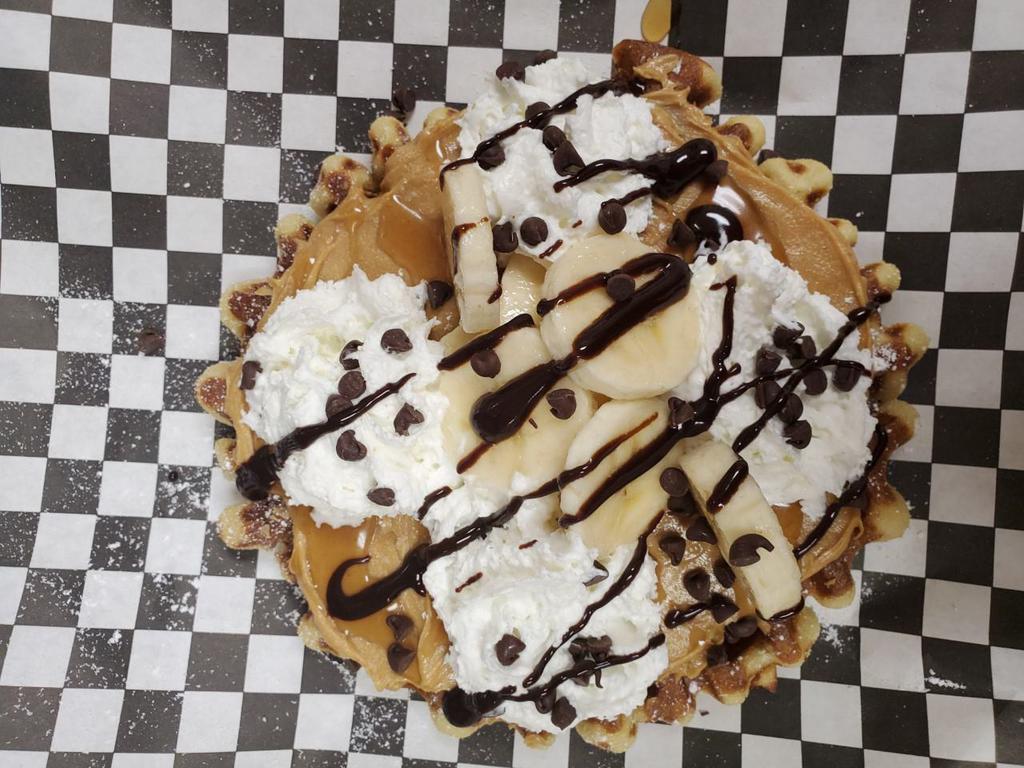 Peanut butter and banana waffle ·  Made to order- sweet cream waffle, creamy peanut butter, fresh banana, whipped cream, and chocolate sauce