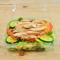 Chicken Salad · Grilled chicken, lettuce, tomatoes, cucumbers and cheddar cheese. 
