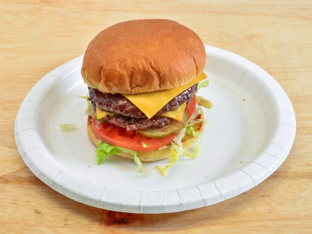 2. Cheeseburger · 1/4 lb. patty, lettuce, tomato, pickle and mayo, and American cheese.
