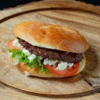 Feta Burger · 1/3 lb Chuck Patty, Feta Cheese, Mayo, Lettuce, Tomato, Onions, on a homemade bun