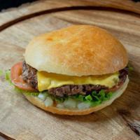 Classic Cheeseburger · 1/3 lb Chuck Patty, Choice of Cheese, Mayo, Lettuce, Tomato, Onions, on a homemade bun