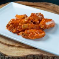 Wings · Hand Breaded Amish Chicken Wings. Fried Fresh to order available in 6 or 12 pieces