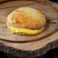 Kid's Grilled Cheese · Kid's Grilled Cheese. Choice of Cheese 2 Slices on a Homemade Bun. Served with Fries and a d...