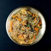 Japchae · Glass noodles with assorted vegetables.