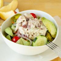 Greek Salad · Small salad with feta cheese on the side and creamy dressing.