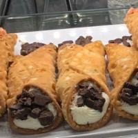 Cannoli Siciliani · A pastry shell filled with ricotta from Sicily, and chocolate chips.