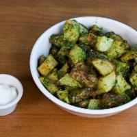Spicy Potato · Diced potato, deep fried and mixed with our house garlic cilantro sauce.