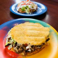Gorditas · Soft corn dough served with choice of meat, beans, lettuce, tomato, onion, cheese, and sour ...