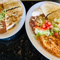 Quesadilla ·  Served with rice and beans, choice of steak, pork, Mexican sausage, tongue, chicken, ground...
