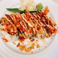 Crunchy Special Roll · Inside: shrimp tempura, pickled burdock cucumber.
On top: fried onion flake, flying fish egg...