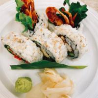 Spider Special Roll · Inside: deep fried soft shell crab, avocado, pickled burdock, flying fish egg (Tobiko), gree...