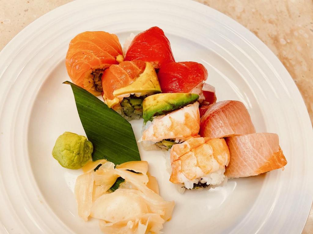 Rainbow Special Roll · Base: shrimp california roll.
On top: Tuna, yellowtail (Hamachi), salmon, shrimp, avocado.