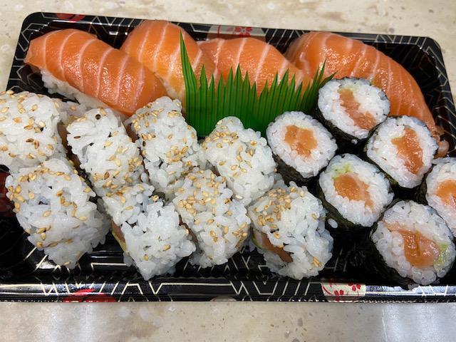 Salmon Lovers · 4 pieces nigiri with salmon roll and salmon avocado roll.