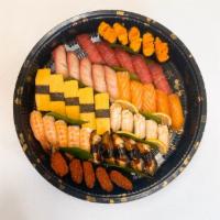 Nigiri Platter B  · 45 pieces. Tuna, yellowtail, salmon, shrimp, eel, egg, ikura(salmon roe), uni(sea urchin) an...