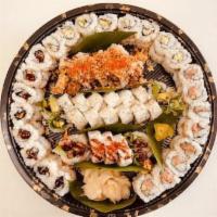 Roll Platter · 77 pieces. Spicy tuna, shrimp California, eel cucumber and vegie - 16 pieces each. Crunchy -...