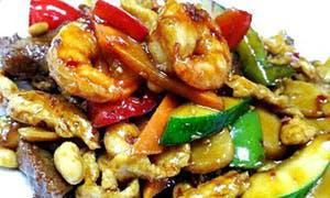 Kung Pao Delight · Combination of beef, chicken, shrimp in spicy brown sauce, and peanuts. Spicy.