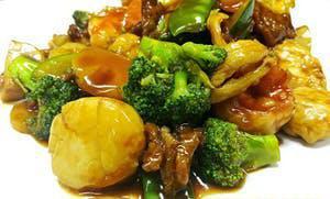 Happy Family · Beef, chicken, shrimp, scallops, and assorted vegetables in chefs special brown sauce.