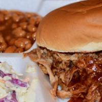 Mr. Pig Pulled Pork Sandwich Platter · Award-winning slow-smoked pulled pork on a fresh bun with DR Famous BBQ sauce. Served with B...