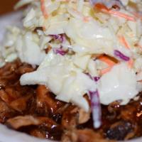 Miss Piggy Pulled Pork Bowl · Our famous pulled pork topped with DR coleslaw and BBQ sauce.