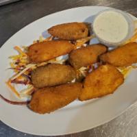 Jalapeno Poppers · Stuffed with cheese and fried.