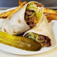 Cheeseburger Wrap · Our fresh ground burger stuffed in a flour tortilla with melted American cheese, lettuce, to...