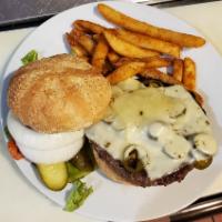 Garlic Habanero Burger · Topped with pepper jack cheese, grilled jalapenos and finished with our house made garlic ha...