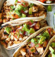 2 Grilled Chicken Tacos · Grilled chicken, pico de gallo, lettuce, cilantro, onions, and shredded cheese. Come with ci...