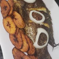 Grilled Tilapia with Plantain · Cooked on a rack over a grill. 