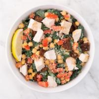 Gluten-Free Kale Caesar Salad · Shredded kale, parmesan cheese, chickpeas, diced tomatoes, vegan caesar dressing, lemon wedg...