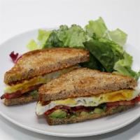 Breakfast Club Sandwich · Egg, bacon, tomato, avocado, sriracha mayo, organic whole grain toast served with mixed gree...