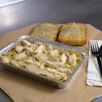 Chicken Pesto Pasta · Grilled chicken strips on pasta with creamy basil pesto and finished with Pecorino Romano ch...