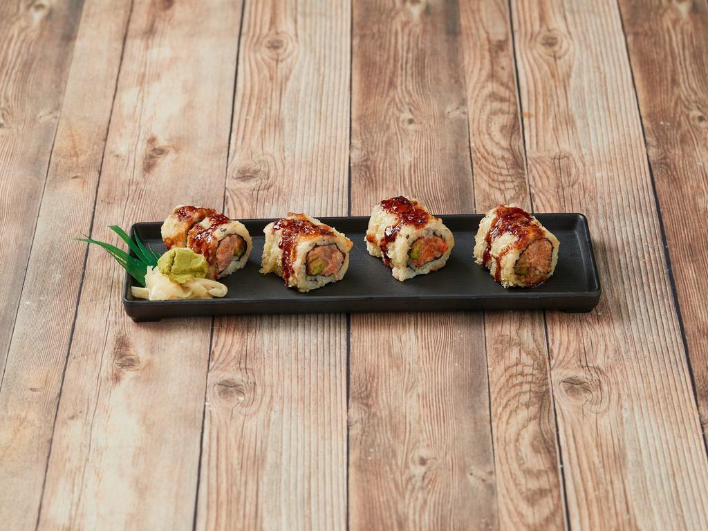 S16. Kobe Roll · Tuna, yellowtail, salmon, avocado, tempura fried with special sauce.