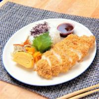 Chicken Breast Katsu Bento · chicken breast katsu, rice, side condiments, pickles, tonkatsu sauce