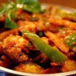 82. Shrimp Jalfrazie · Jumbo shrimp cooked with onions, tomatoes, and bell peppers cooked in curry sauce.serve with...