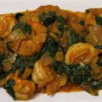 84. Saag Shrimp · Shrimp cooked in curry spices with spinach.sreve with rice