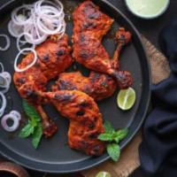 98. Tandoori Chicken · 6 pieces. Chicken with bone, marinated in spiced yogurt and roasted ina clay oven.seve with ...